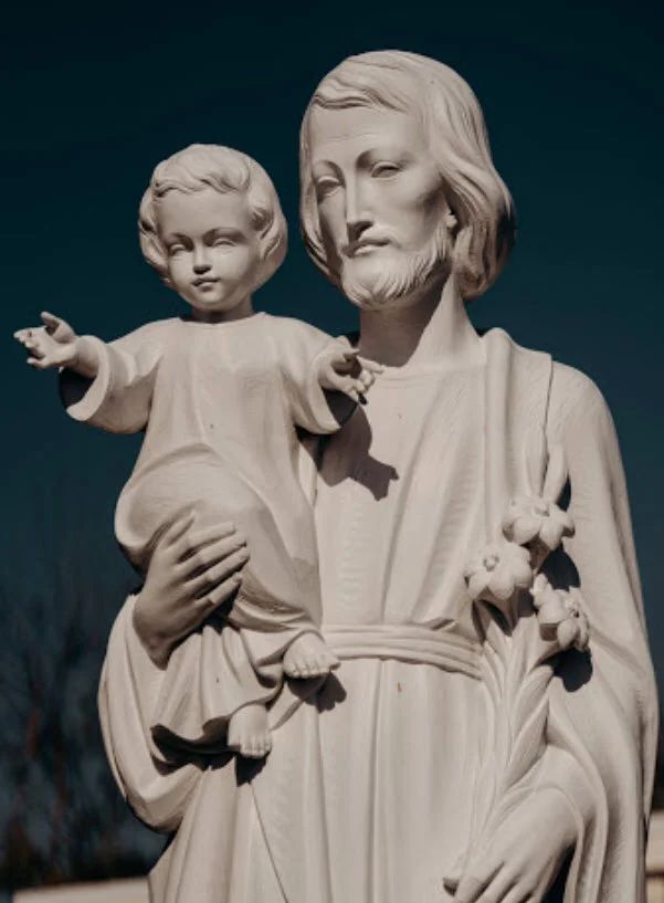A statue of St. Joseph holding the Christ Child