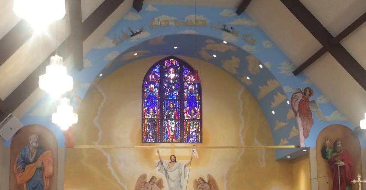 The sanctuary of St. Paul in North Hollywood, with its stained glass window and painted apse